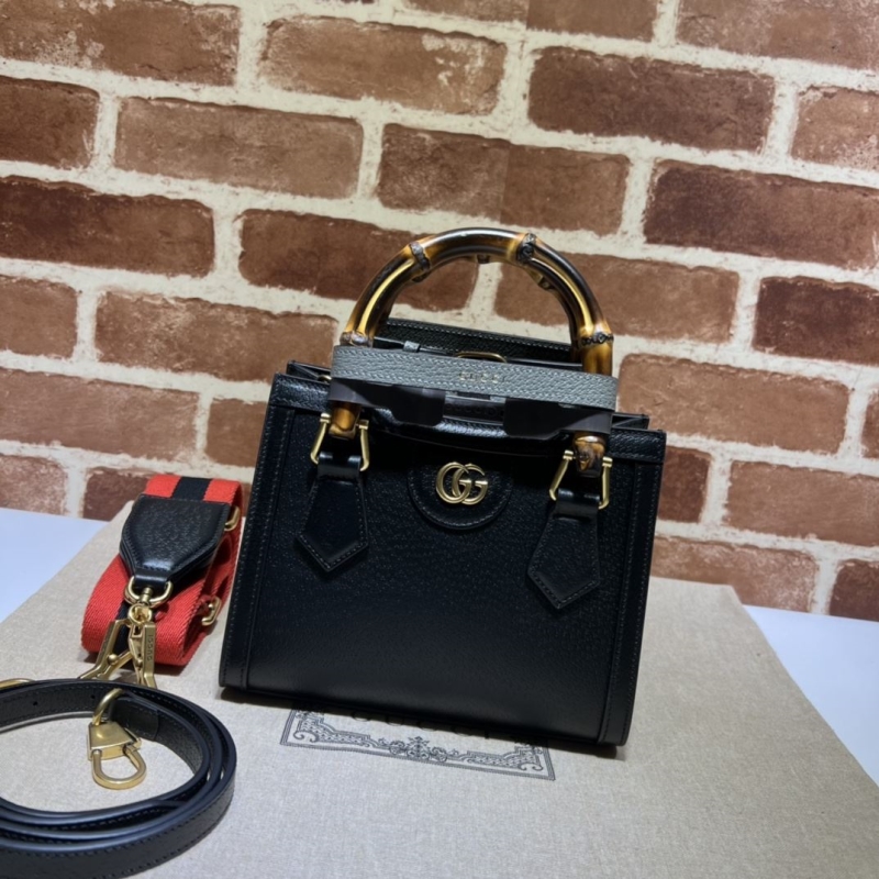 G*u*i top handle bags
